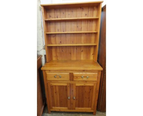 A modern Pine shelf back dresser