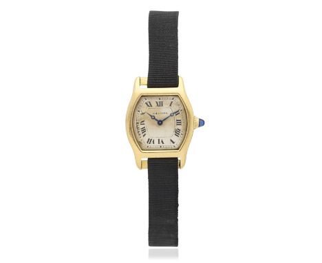 Cartier. A rare and early lady's 18K gold manual wind tonneau form wristwatchModel: TortueReference: 3457Date: London Import 