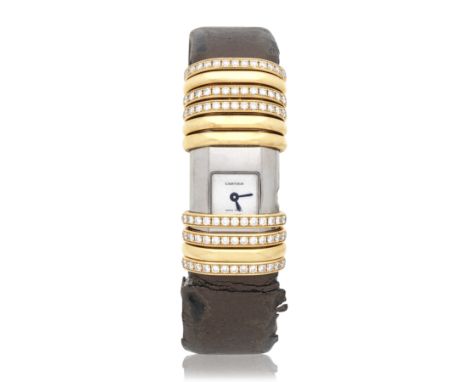 Cartier. A lady's gold and titanium diamond set quartz wristwatchModel: DecolrationReference: 2611Date: Purchased 18th Octobe