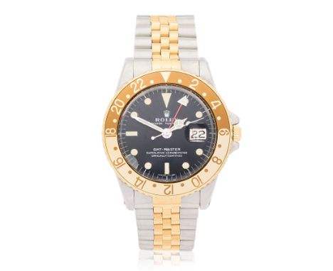 Rolex. A stainless steel and gold automatic calendar bracelet watch with dual time zoneModel: GMT-MasterReference: 1675Date: 
