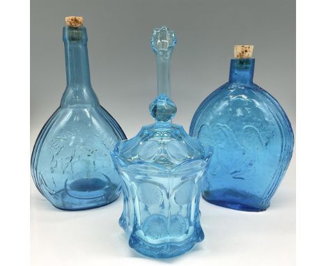 Cornflower blue glass bottles - Jenny Lind molded bust design on front from Empire Glassworks, flask bottle with molded eagle