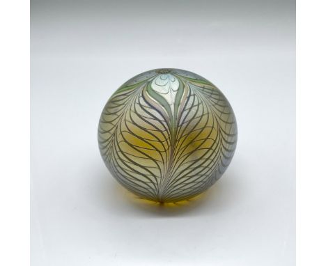 Opalescent green and yellow four-petal flower orb. Orient &amp; Flume stickered and carved marking on the underside. Issued: 