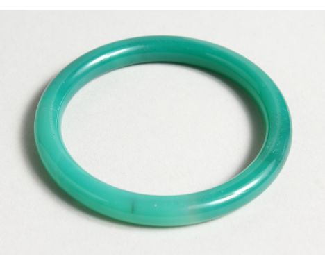 A GOOD JADE BANGLE, 3 inches diameter.