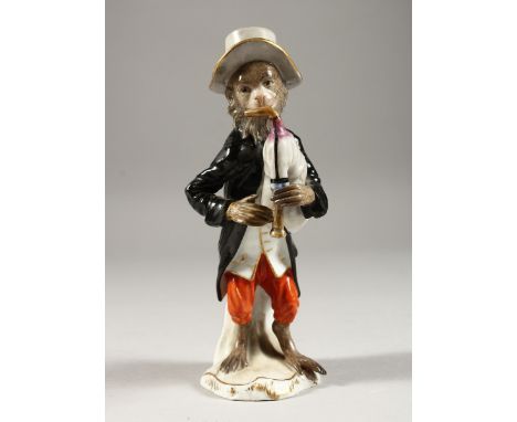 A GOOD 19TH CENTURY FURSTENBERG PORCELAIN MONKEY FIGURE playing a bagpipe. F mark in blue.  6ins high.