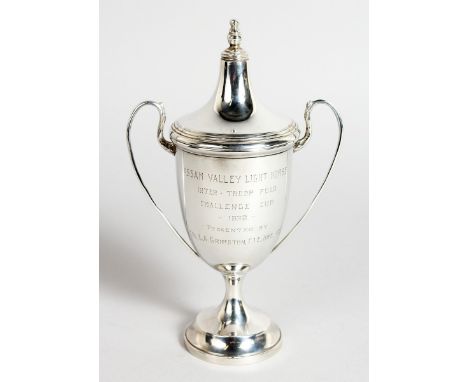 A POLO TROPHY, TWO HANDLED CUP AND COVER, 6.5 INS HIGH (ASSAM VALLEY LIGHT HORSE INTER TROOP POLO CHALLENGE CUP 1923) London 