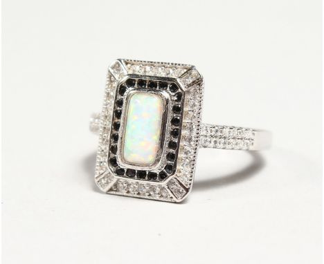 A SILVER ART DECO DESIGN OPAL RING