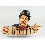AN AMUSING CHARLIE CHAPLIN TOILET SIGN, 2 ft. 3 in. high.