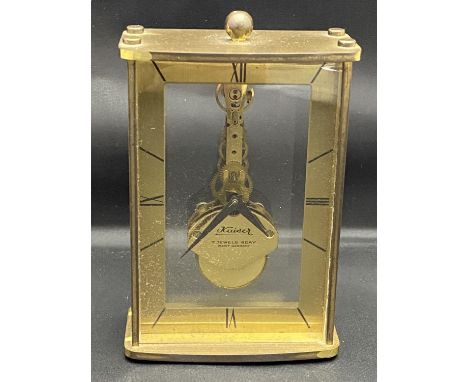 A vintage Kaiser 7 jewel 8 day brass skeleton mantle clock, working order