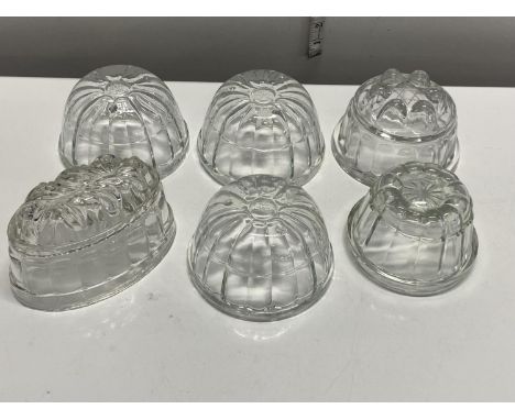 Six vintage glass jelly moulds, shipping unavailable