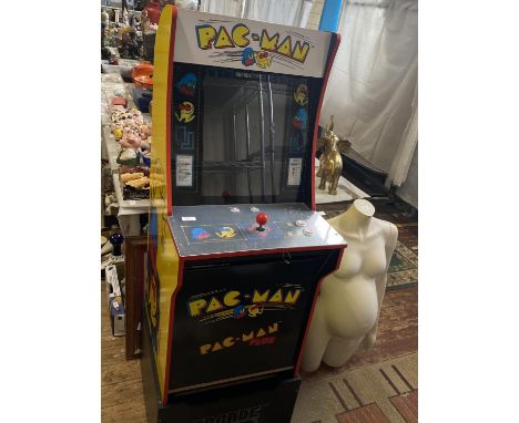 A vintage style Pac Man arcade game (working but needs attention), shipping unavailable