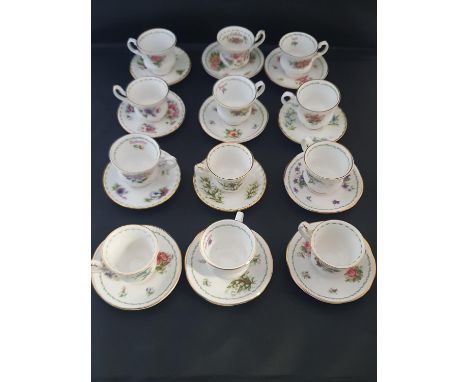 A miniature Royal Albert, Elizabethan bone china tea set 'Calendar Months'. twelve cups and saucers.