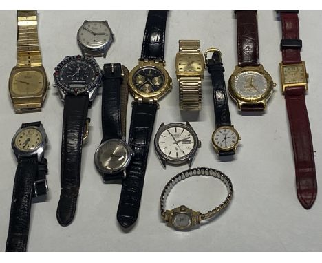 A box full of assorted watches including Seiko, Timex, Services, Citizen etc