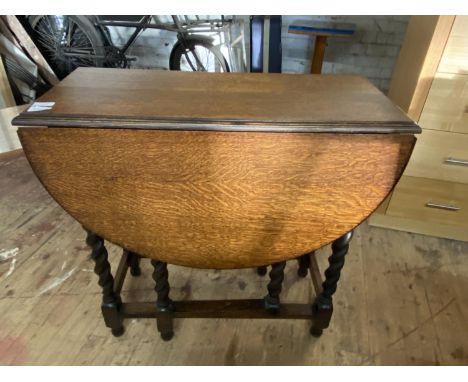 A small antique oak gate leg barley twist table, shipping unavailable