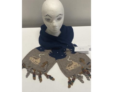 A new with tags hand knitted Qiviuk scarf