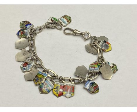 An .800 silver chain and charms bracelet