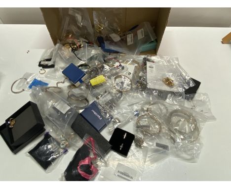 A large box of assorted vintage costume jewellery