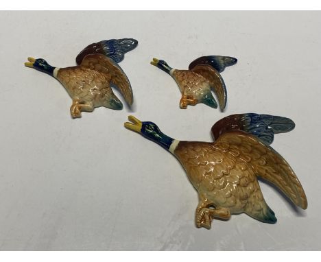 Three ceramic graduated Sylvac flying wall ducks