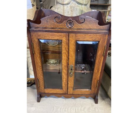 A vintage oak smokers cabinet with two interior drawers 45x33x18cm, shipping unavailable