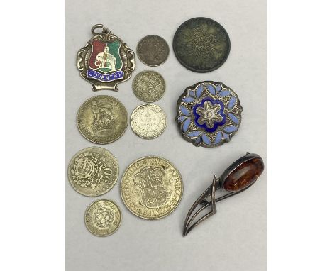 A selection of assorted silver including brooches and coins