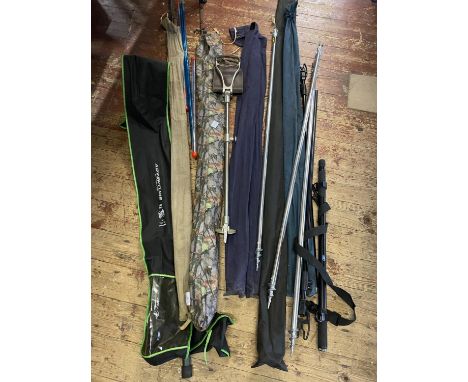 A selection of assorted fishing tackle including vintage rods, rod rests, shooting stick and other items, shipping unavailabl