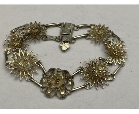 A vintage white metal bracelet