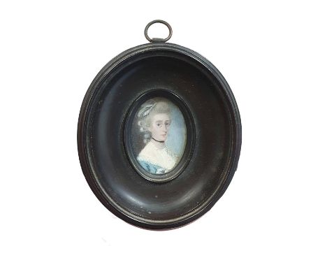 A framed painted miniature portrait of a lady dated 1789 signed Read in a oval wooden frame overall dimensions 9x8cm