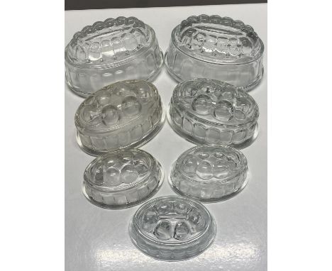 Seven vintage glass jelly moulds, shipping unavailable