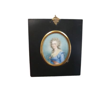A 19th century framed miniature portrait in a ebonised frame depicting a lady 13x12cm