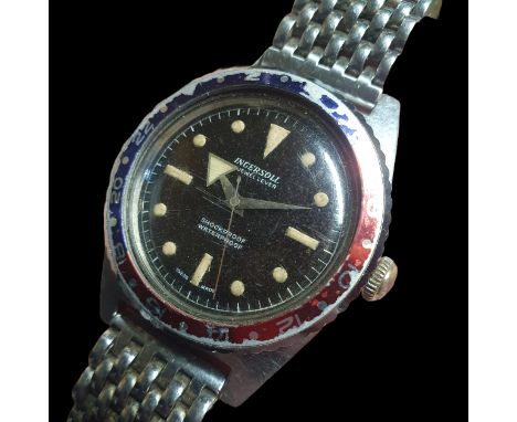A rare Ingersoll 5903 17 jewel diver's watch. Lume in good condition, "big arrow" hour hand with Pepsi bezel. Vintage "beads 