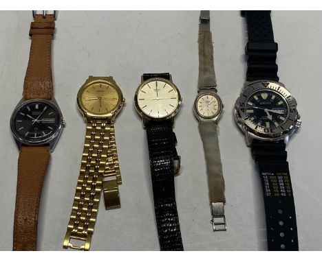 A selection of vintage Seiko watches including a Seiko Black Monster (needs attention)