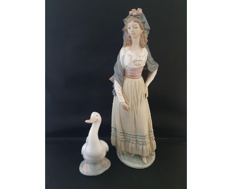A large Lladro figurine h33cm with a Nao Goose
