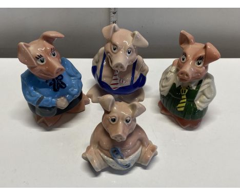 Four Natwest Wade piggy banks, all with stoppers, shipping unavailable
