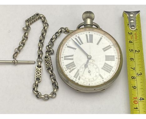 A Goliath pocket watch. Argentan marked. Albo silver chain. Ticking at time of cataloguing.