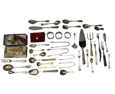Small quantity of silver, to include two Edwardian napkin rings with pierced decoration, Georgian teaspoon, Victorian sifting