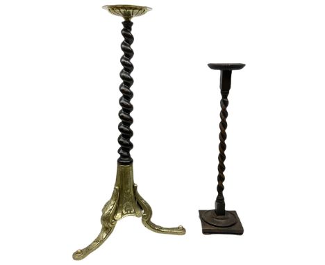 Mahogany candle stand, with small brass dish supported on barley twist column and three brass cabriole legs, together with an