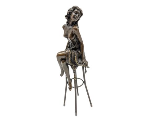 Art Deco style bronze modelled as a bare chested female figure, seated upon a chair, after 'Pierre Collinet', H26.5cm
