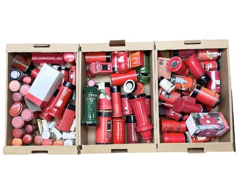 Collection of Post Box money boxes comprising ceramic, tin plate and plastic models, to include Crested Ware money boxes bear