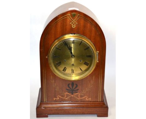 A mahogany inlaid chiming mantel clock 