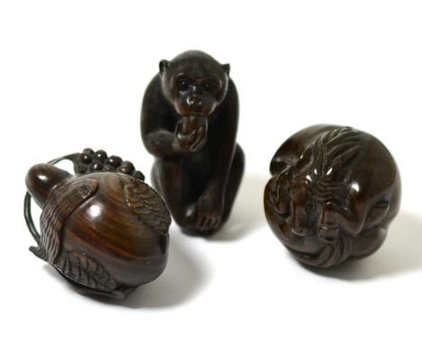 Three Japanese carved wood netsuke 