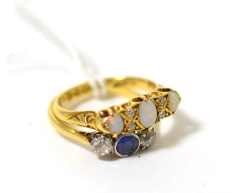 An 18ct gold opal and diamond ring and a sapphire and diamond three stone ring Opal and diamond ring - finger size M, 3.77g g