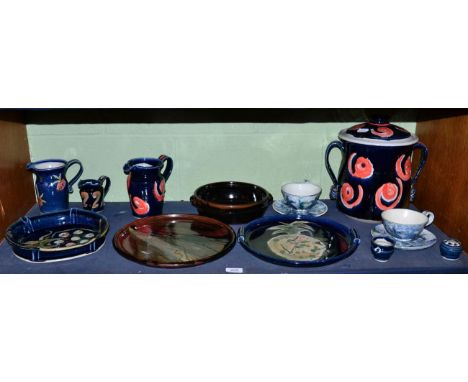 A collection of Isabel K-J Denyer glazed studio pottery (with KK mark) including twin handled pot and cover, plates, jugs, te