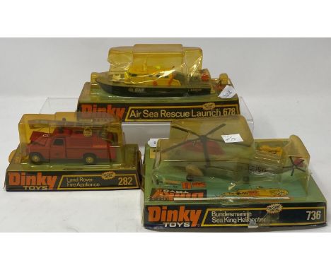 A Dinky Bundesmarine Sea King Helicopter, 736, a Land Rover Fire Appliance, 282 and an Air Sea Rescue Launch, 678, all boxed 