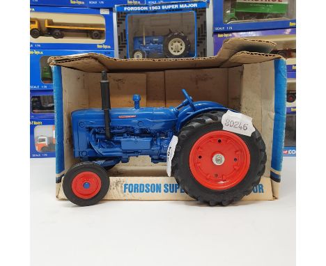 An Ertl Fordson Super Major Tractor, boxed and various other model trucks and tractors, all boxed (box) 