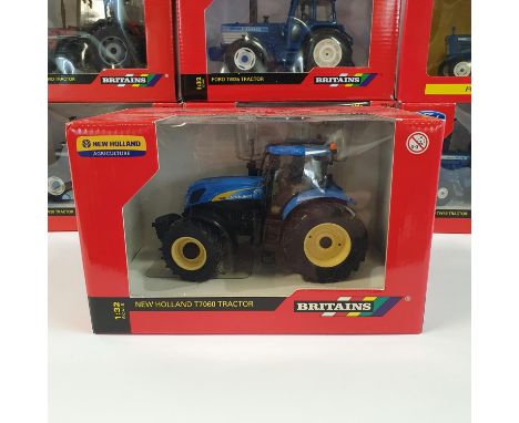 A Britains model tractor, 42301, 42793, 43012, 04180, 42196, 42839, 43001, and 42840 (8) 