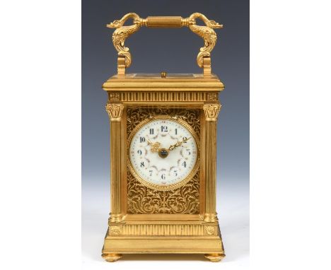 A good carriage clock with repeat, the 5.5 cm diameter dial with Arabic numerals and painted floral festoons within a pierced