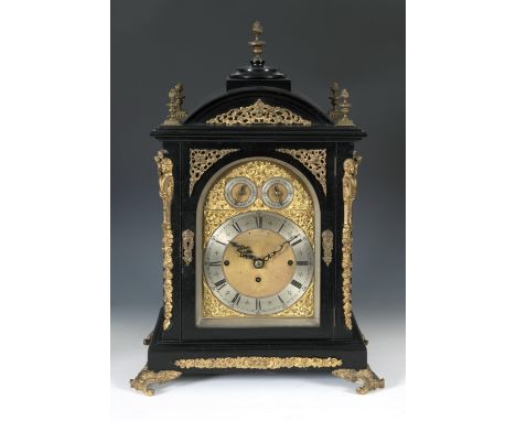 A late Victorian musical bracket clock, with repeat, the 18.5 cm arched square brass dial with a plaque Scorer Havant (detach