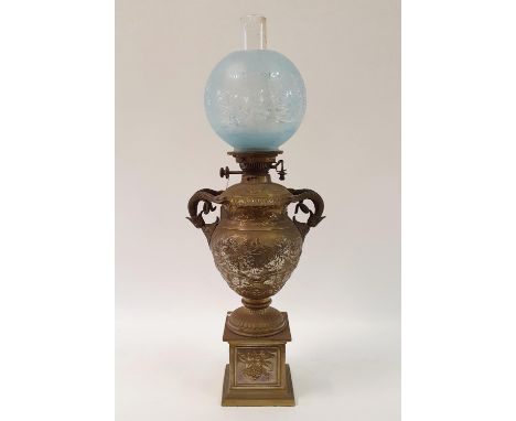 An oil lamp, with an acid etched shade, a clear glass well and a brass mounted marble base in the form of a column, 82 cm hig