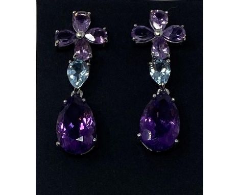 A pair of silver, amethyst and blue topaz drop earrings 