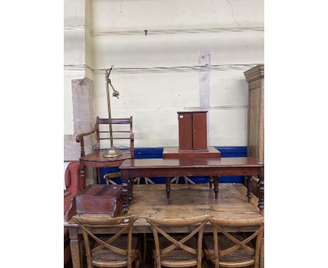 A 19th century mahogany stool, 131 cm wide, a kidney shaped commode, two wall hanging cabinets, a brass standard lamp, and an