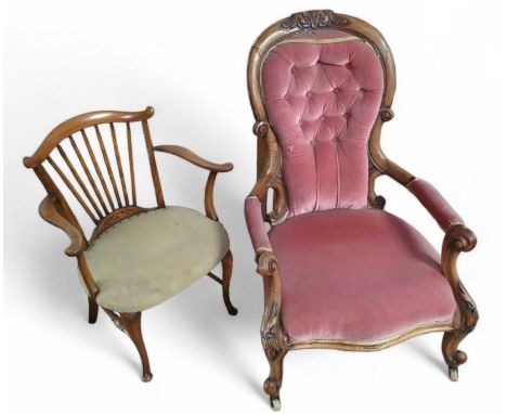 A Victorian button back nursing chair together with an early 20th Century walnut stick back open arm chair (2)